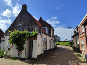 The cosy little house with the sundial